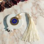 Γούρι 2026 Επιτραπέζιο Κεραμικό Ρόδι με Πλέξι Ακρυλικό Μάτι