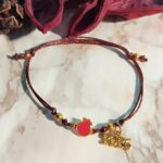 Βραχιόλι Γούρι 2026 επίχρυσο Ρόδι με κόκκινο Σμάλτο σε Γυαλιστερό μπορντό κορδόνι