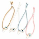 Μαρτυρικά Βάπτισης Βραχιόλι με Λευκό Σταυρό και Μάτι από Λευκό σμάλτο σε σουέτ δέρμα